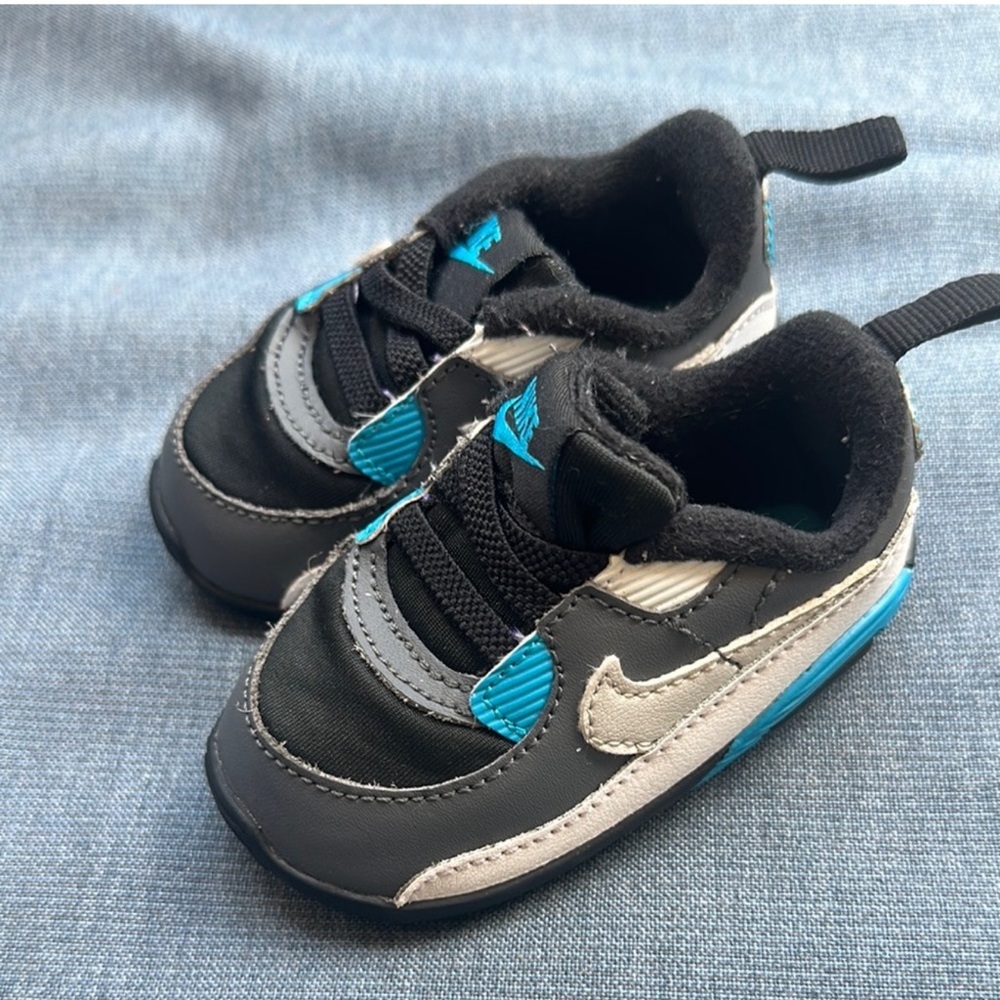 Nike Black and Blue Sneakers with Sporty Design